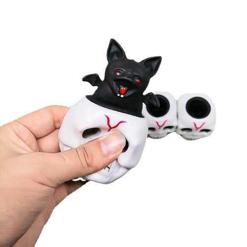 Bat in a Skull Cup