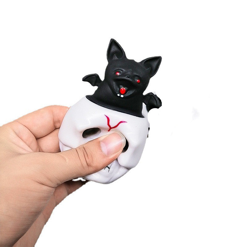 Bat in a Skull Cup